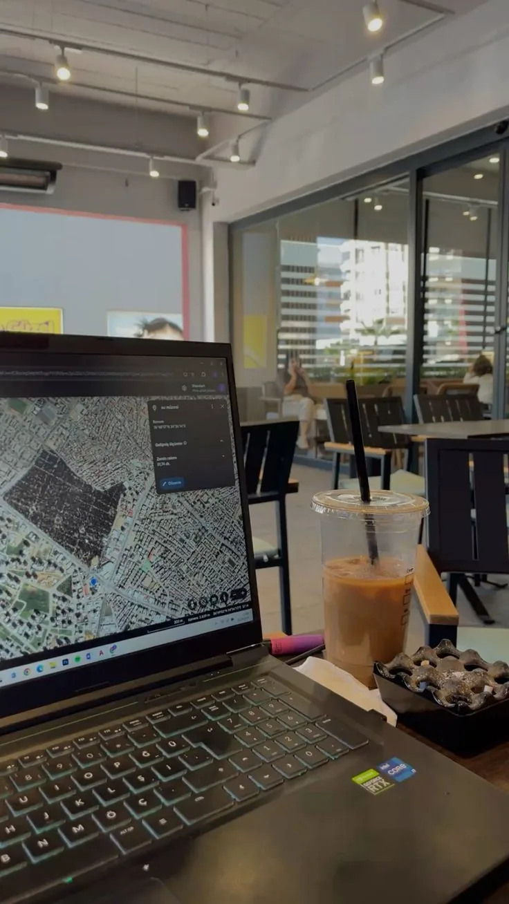 GIS basemap open on a laptop at an engineering workstation