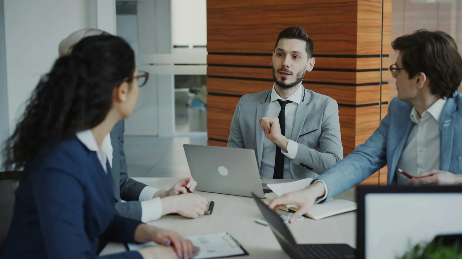 Enterprise team reviewing an ERP implementation plan in a modern office
