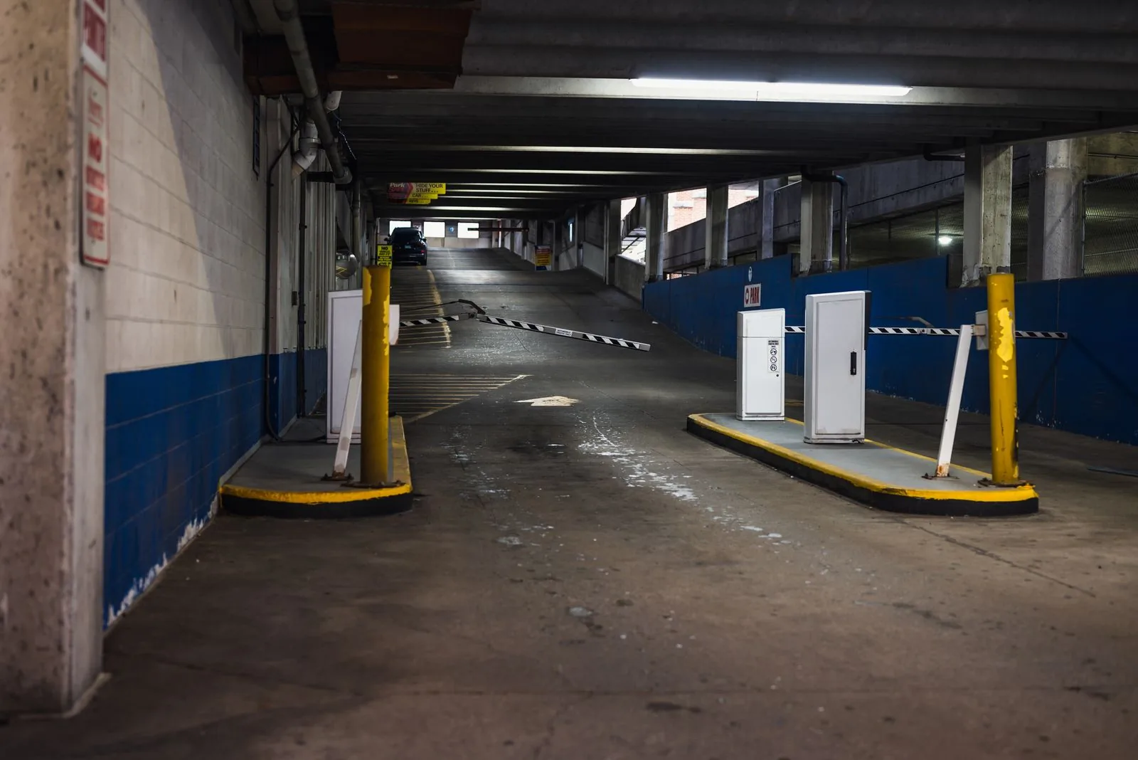 Vehicle boom barrier at an entrance